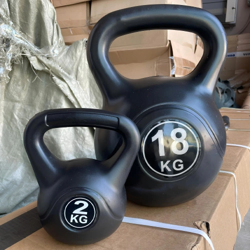 Kettlebells in PVC Second Hand | Various Weights - Background View
