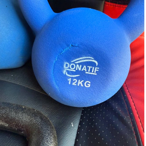 Neoprene Kettlebells with Damage | Various weights - side damage view