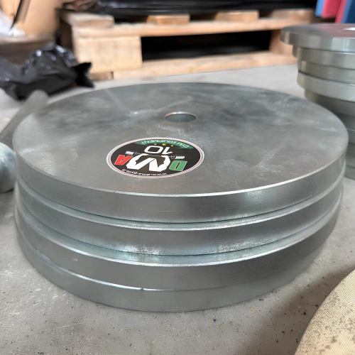 Kit Bilanciere, Manubri e 135 Kg di Dischi | Seconda Mano - Visuale Ravvicinata Dischi