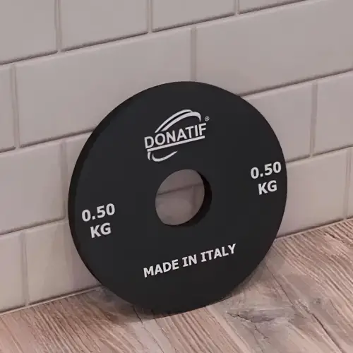 Disco Microload de 500 gr - Agujero 28 mm | Plato pequeño - Gimnasio - Vista de uso del gimnasio