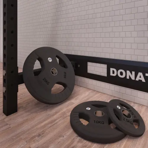 20 Kg gummierte Scheibe - 50 mm Loch | Tri-Grip Grip - Ansicht der auf dem Boden platzierten Scheiben