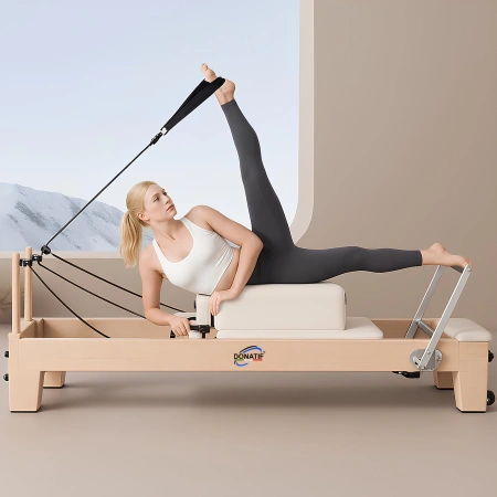 Pilates-Reformer aus Buchenholz - PM17 | Professionell - Übung visuell